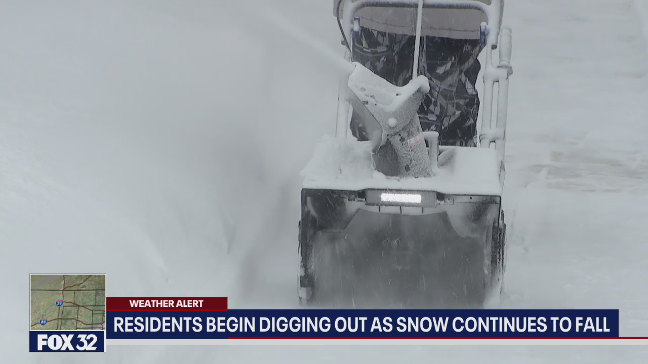 Beverly residents dig out as snow continues to fall