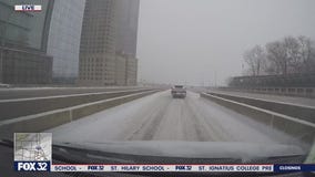 Snow storm continues to lay it on Chicago roads