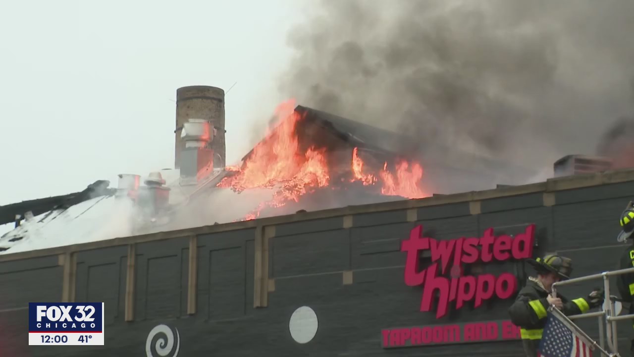 Apartment building fire spreads, destroys Chicago brewery
