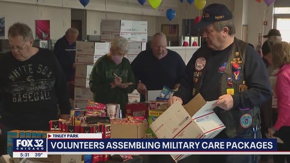 Chicago area volunteers assembling military care packages for US troops