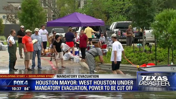 Upbeat Trump pitches in at shelter for Harvey victims