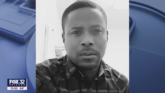 Family members mourn the loss of Jermaine Waterman after he was found shot dead in an apartment fire