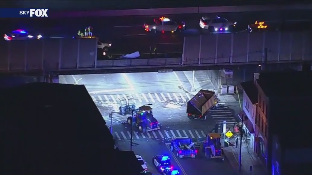 Debris falls from NJ turnpike onto road below