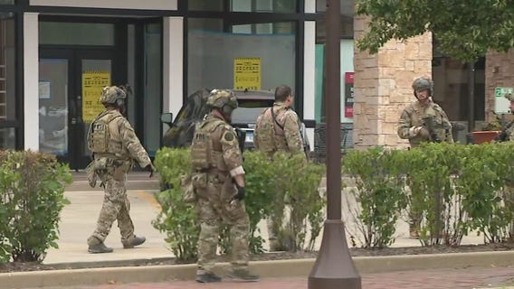 Residents told to shelter in place as police launch manhunt for Highland Park shooter