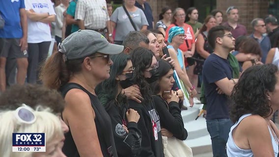 Hundreds gather for moment of silence in Highland Park