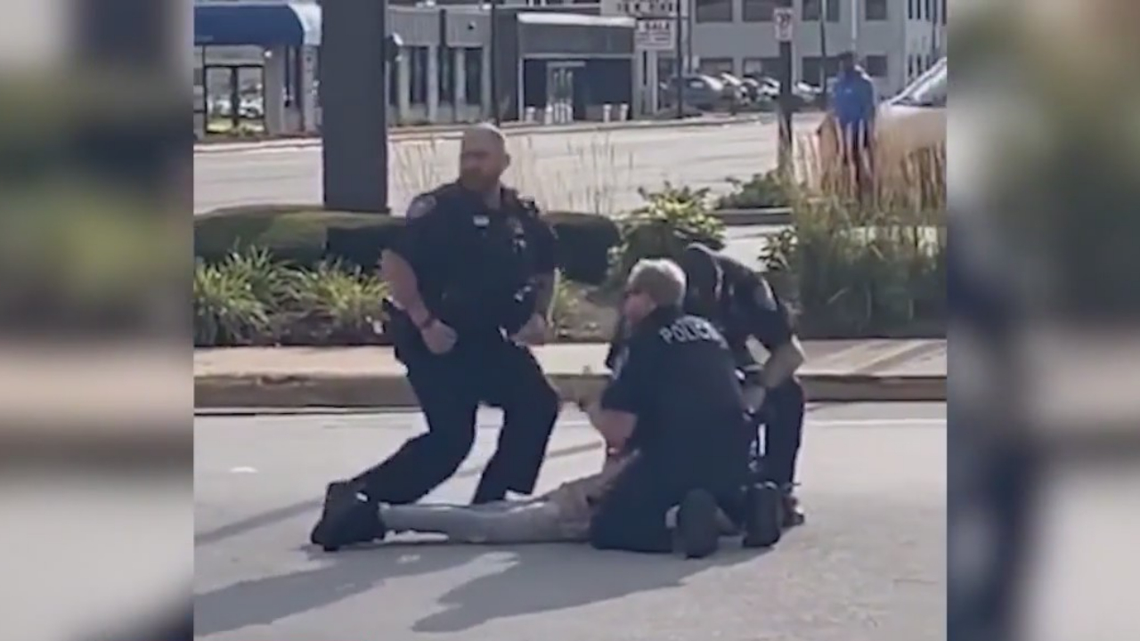 Protesters gather in Oak Lawn to demand charges against cops who punched teenager during arrest