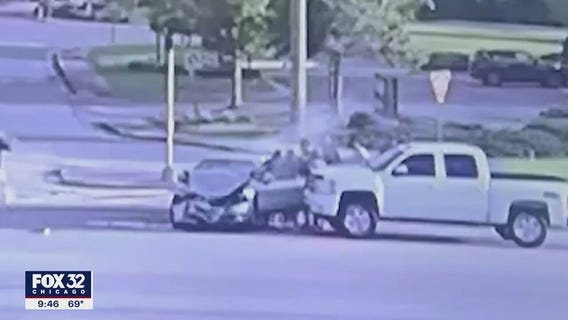 High school football players save woman after crash