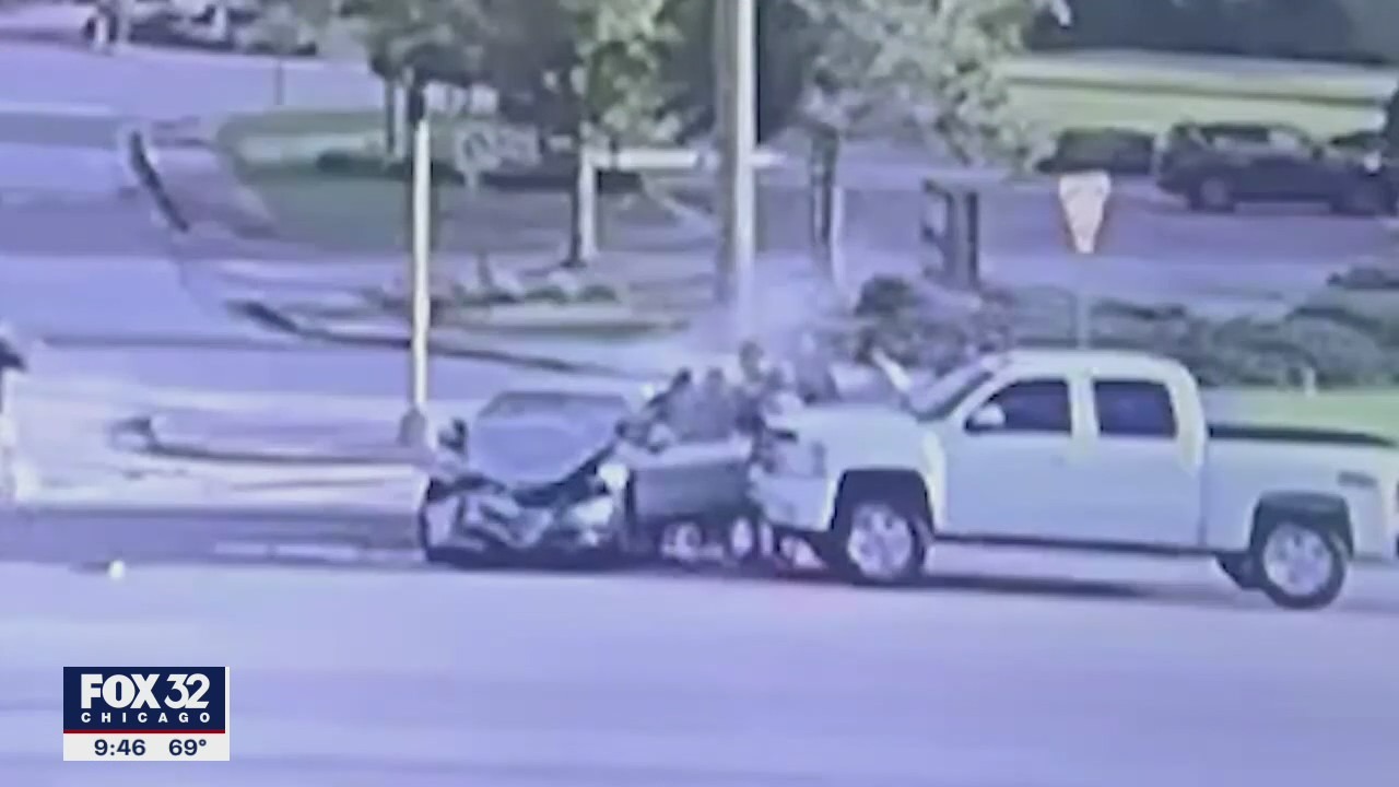 High school football players save woman after crash