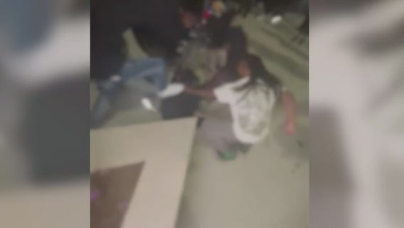 Teen brutally attacked at suburban high school football game, video shows