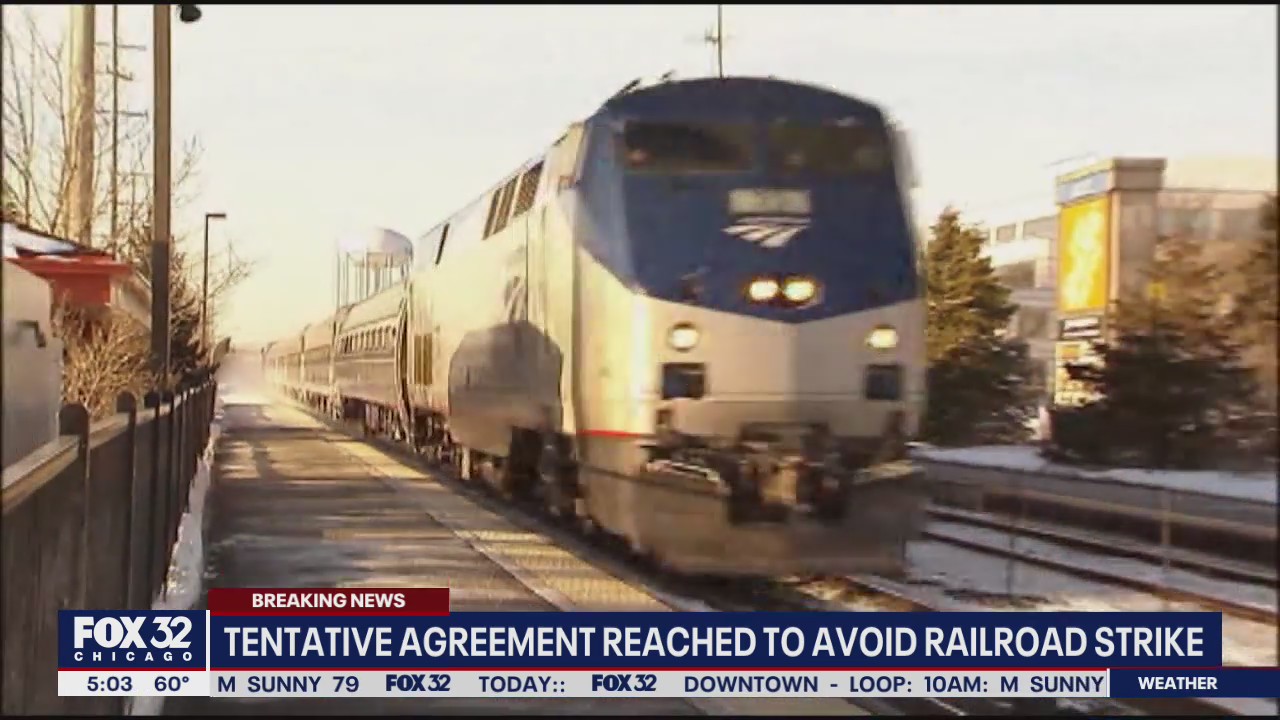Tentative railway labor deal reached, averting strike, Biden says
