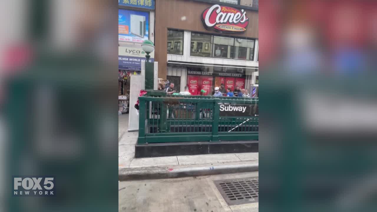 Army of bees take over Queens subway station