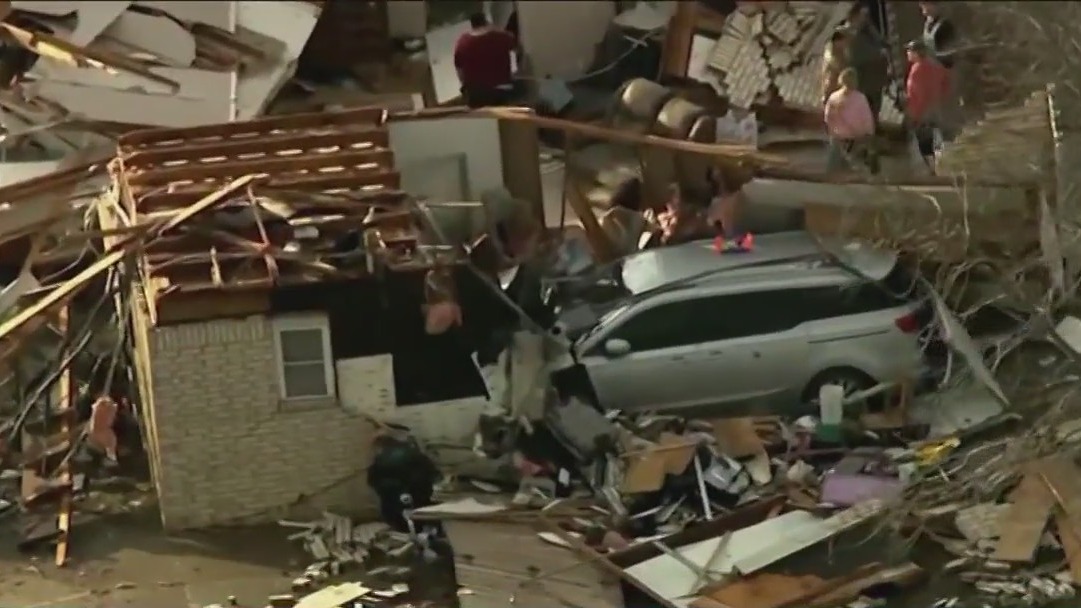 Storm brings tornadoes, blizzard conditions; 2 dead