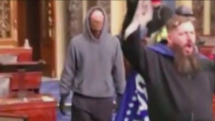 Illinois man who waved Trump flag on U.S. Senate floor on Jan. 6 found guilty of federal charges