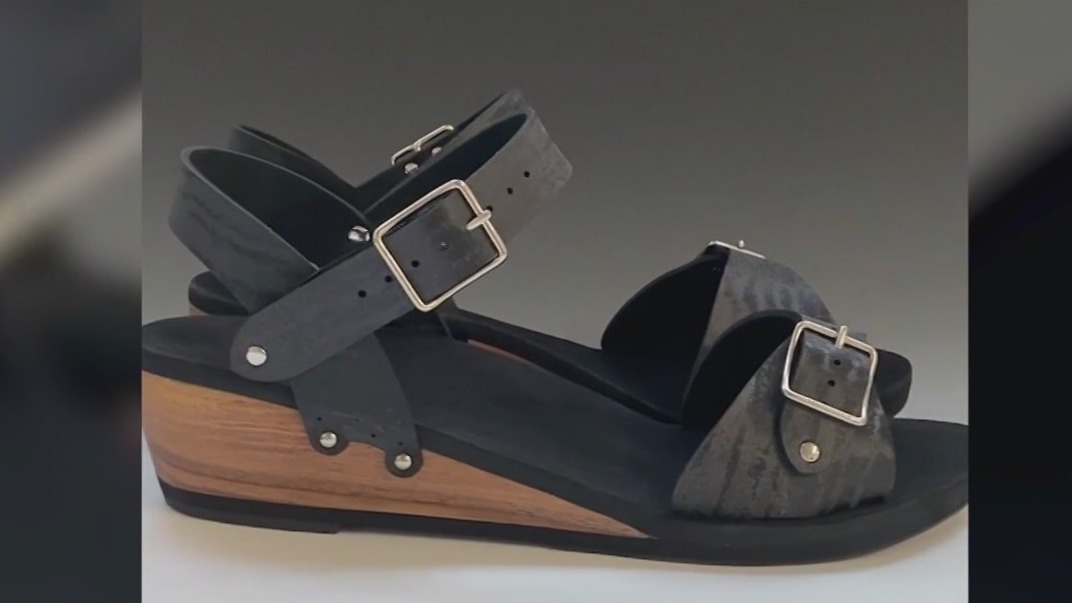 Chicago custom shoe store creates special shoe for woman with world's largest feet