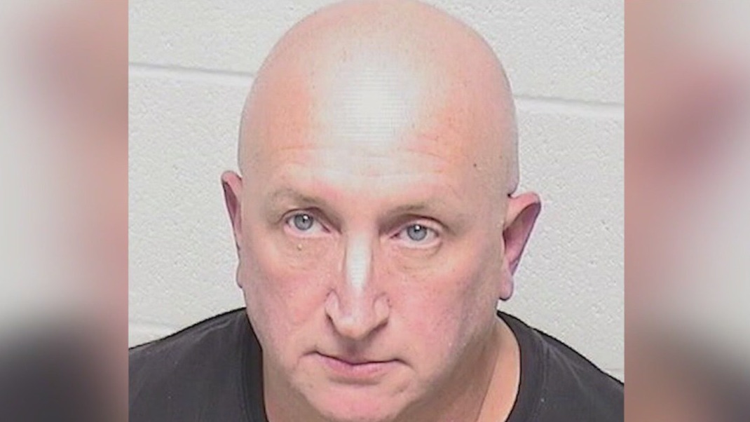 Father of July 4 parade shooting suspect pleads not guilty