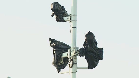 Chicago suburbs clash in fight over information regarding red light cameras