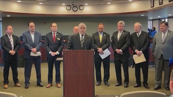 Coalition of suburban mayors stand against proposed rail merger