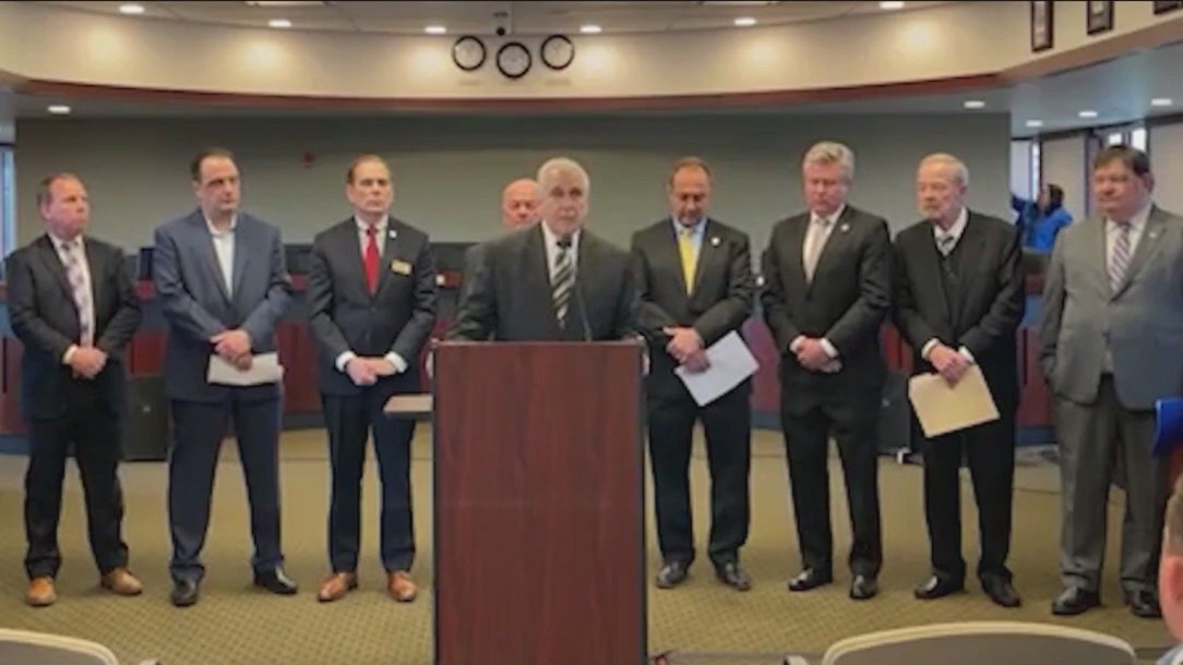 Coalition of suburban mayors stand against proposed rail merger