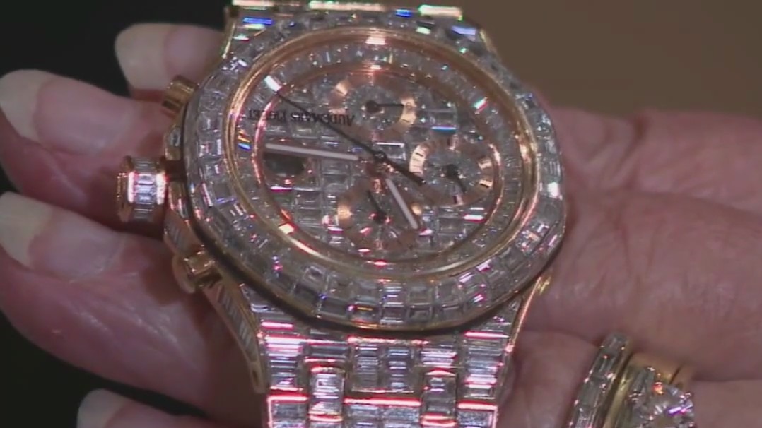 Suspect on the run after arrest in watch theft