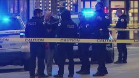 2 shot while inside Chicago business