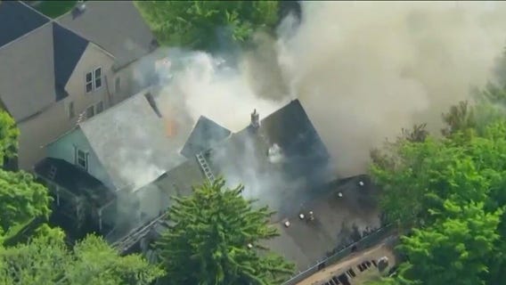Chicago firefighters battle house fire in Roseland neighborhood