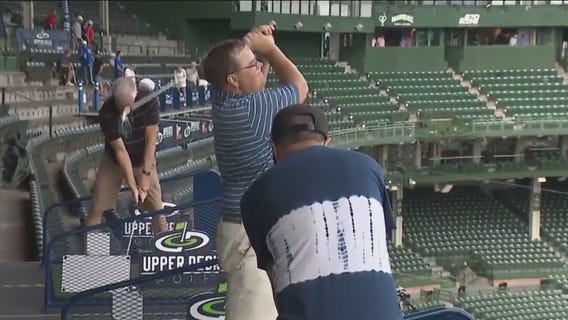 Golfers flock to Wrigley Field to show off their swings