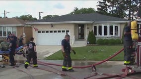 Chicago firefighter remains in serious condition after house fire