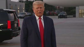 Trump defiant after arrest, claims election stolen