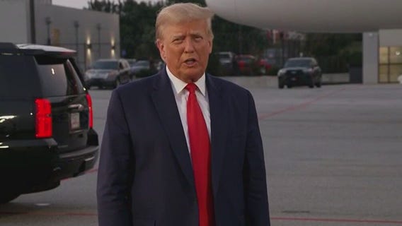 Trump defiant after arrest, claims election stolen