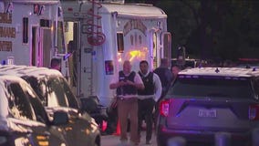 1 in custody, another at large after allegedly committing armed robbery in Chicago suburb