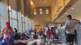 Background checks raise concerns as migrants prepare to move into Greektown