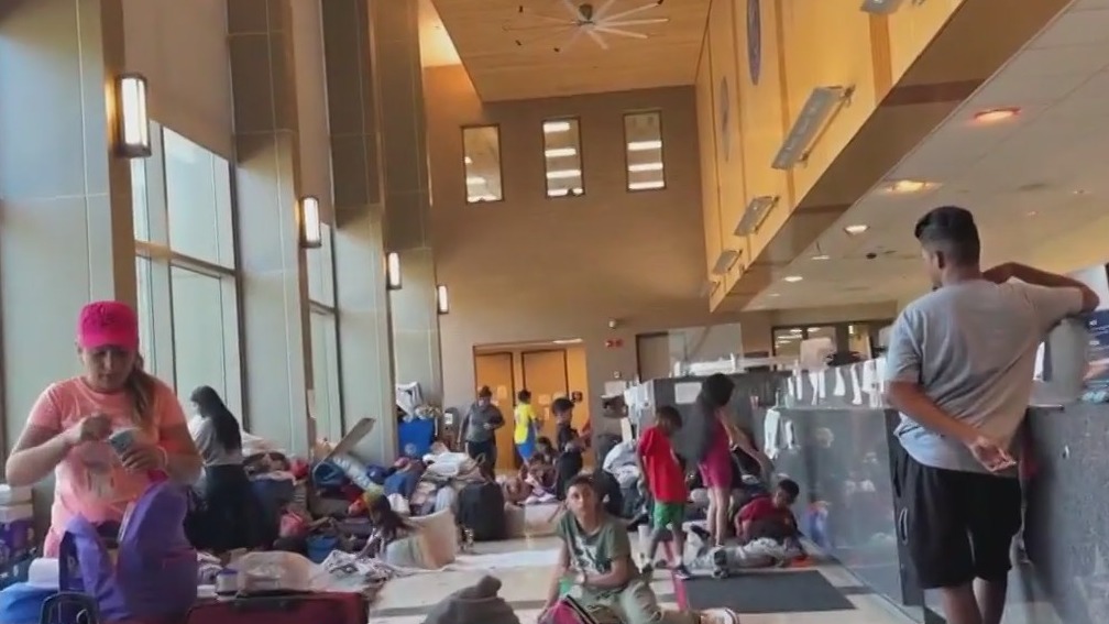 Background checks raise concerns as migrants prepare to move into Greektown