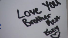 Vigil held for suburban student killed after homecoming game