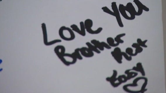 Vigil held for suburban student killed after homecoming game