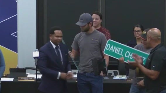 Aurora city workers honored for saving boy's life