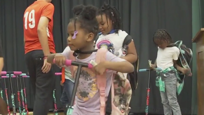 Students in Beverly get brand new scooters