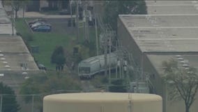 Train derails in Elk Grove Village, striking business