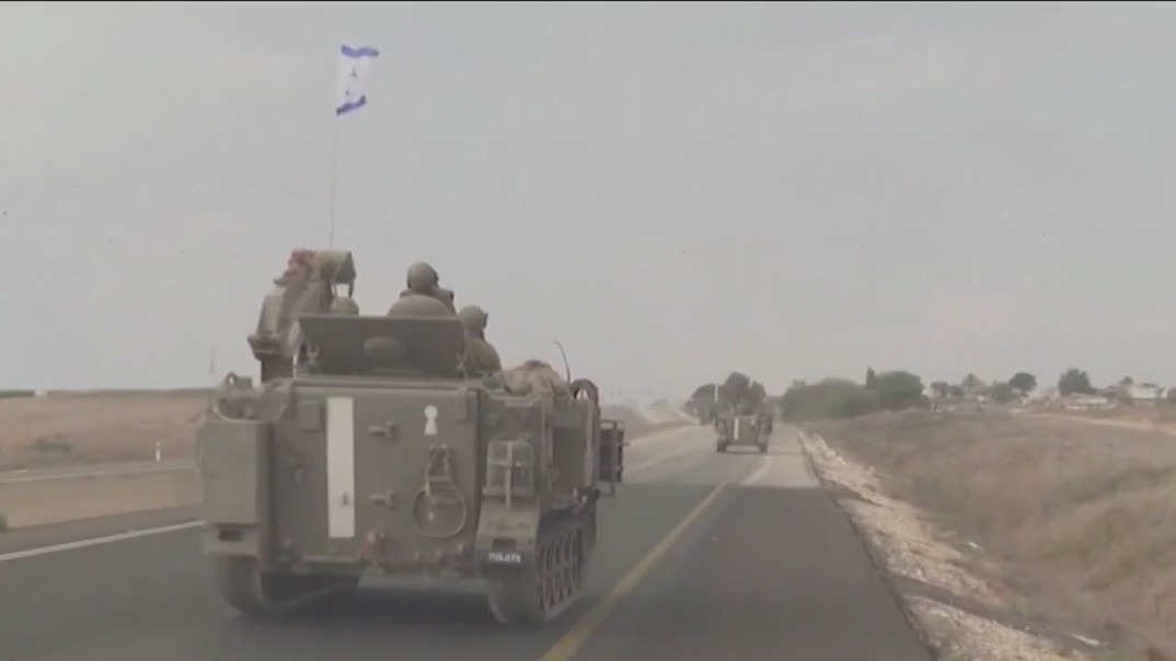 Gaza awaits aid from Egypt as Israel readies troops for ground assault