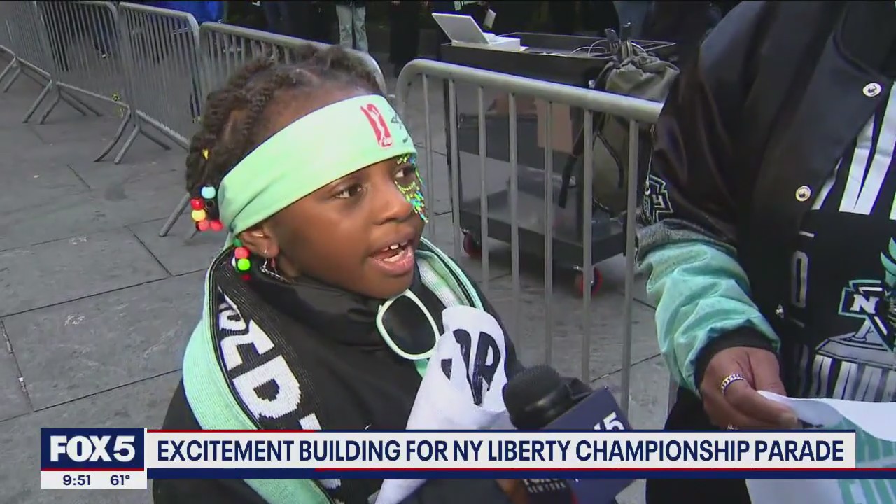 ?Liberty is my favorite!? Young girl gets excited for New York Liberty ticker-tape parade
