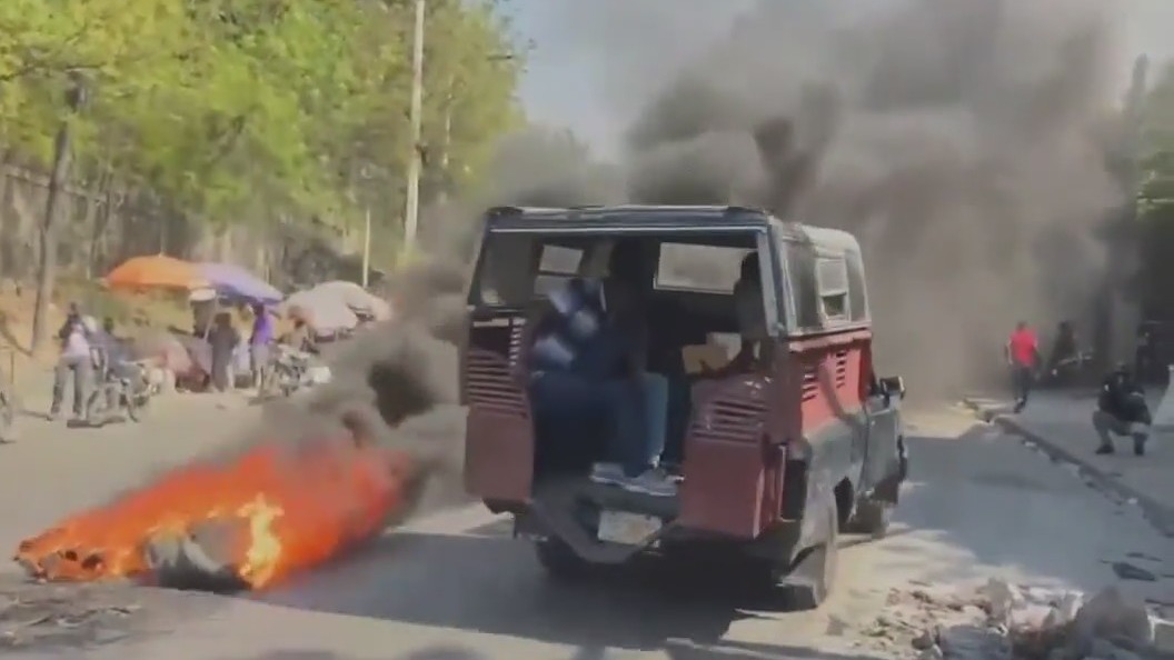 Violence surging in Haiti, preventing prime minister from returning