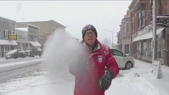Spring snowstorm dumps inches on parts of Chicago
