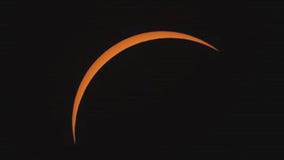 People gather along path of totality to see eclipse