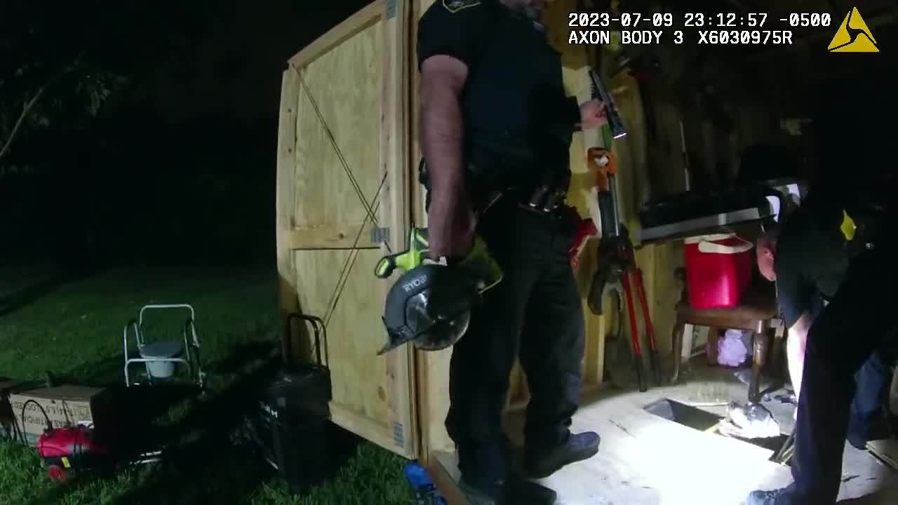 NRH police rescue dog stuck under shed