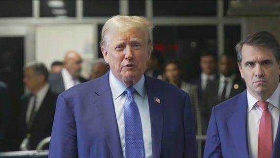 Donald Trump takes shots at President Biden outside hush money trial