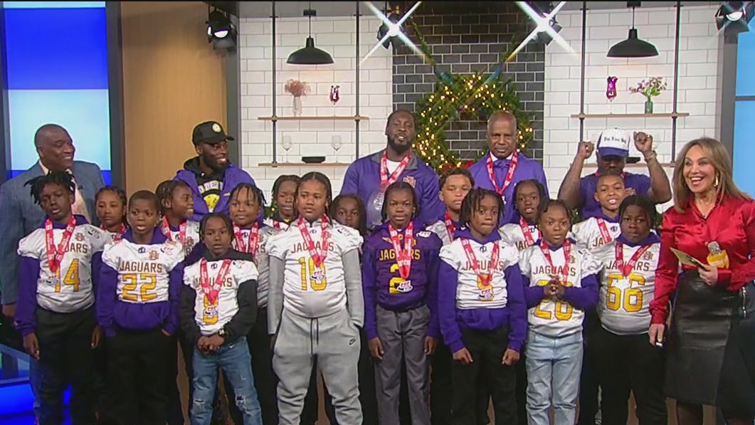 Brooklyn youth football team celebrates victory