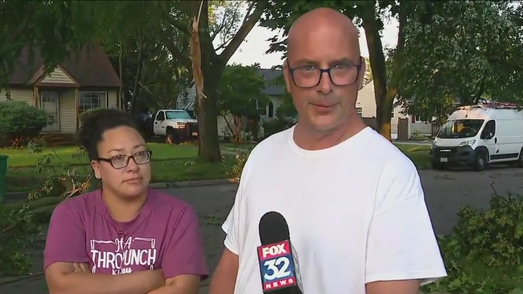 Suburban residents recount tree falling on home