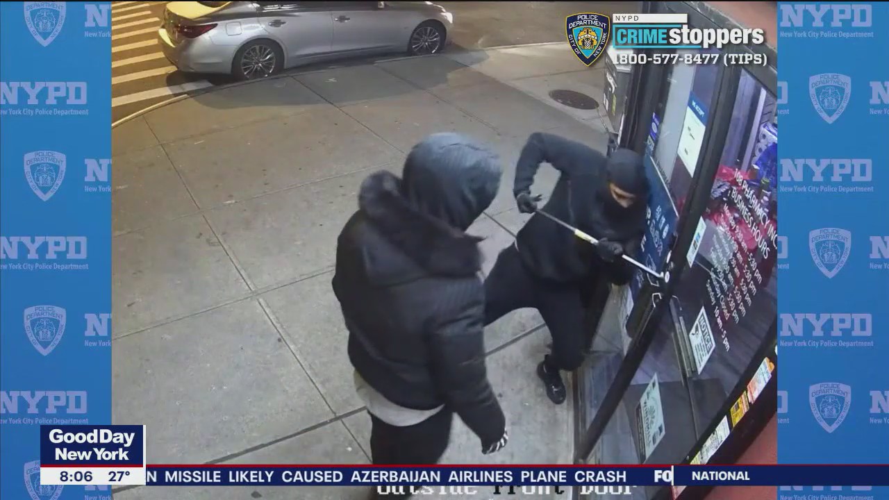 Watch burglars struggle to break into pharmacy