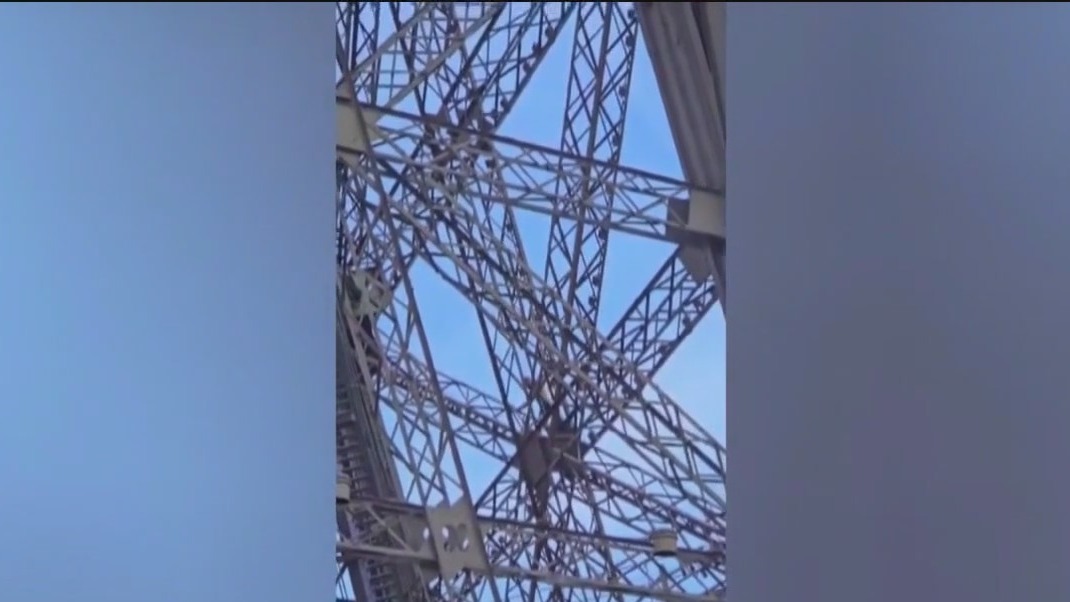 Man caught climbing Eiffel Tower hours before Olympics closing ceremony