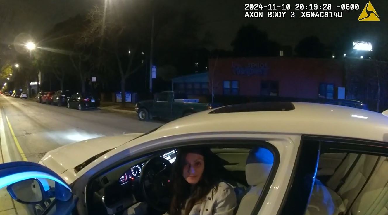 Body camera video shows arrest of Cook County official
