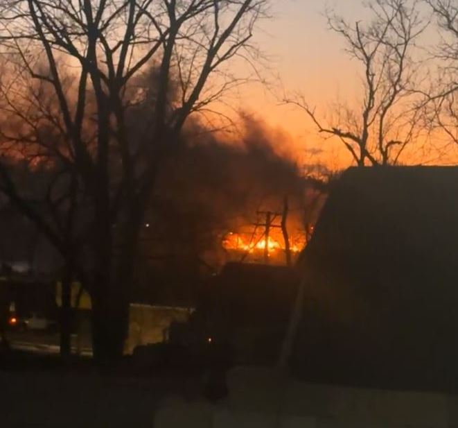 Large fire in Elgin: Metra service halted, public urged to avoid the area